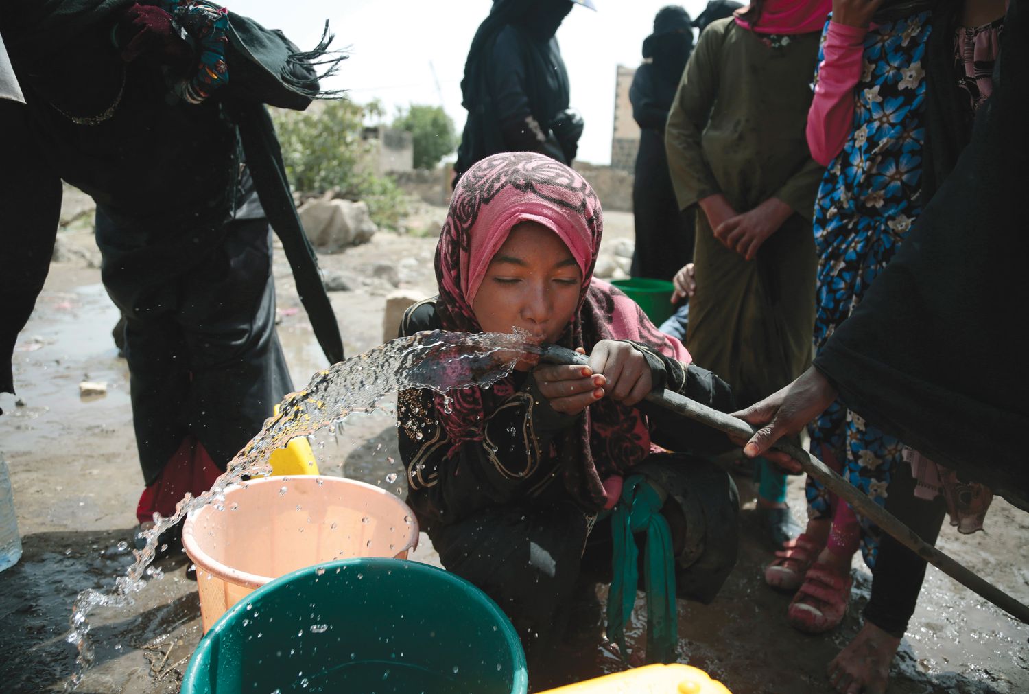  A GIRL DRINKS WATER ALLEGED TO CONTAIN THE BACTERIUM VIBRIO CHOLERA ON THE OUTSKIRTS OF SANAA, YEMEN (ASSOCIATED PRESS PHOTO).