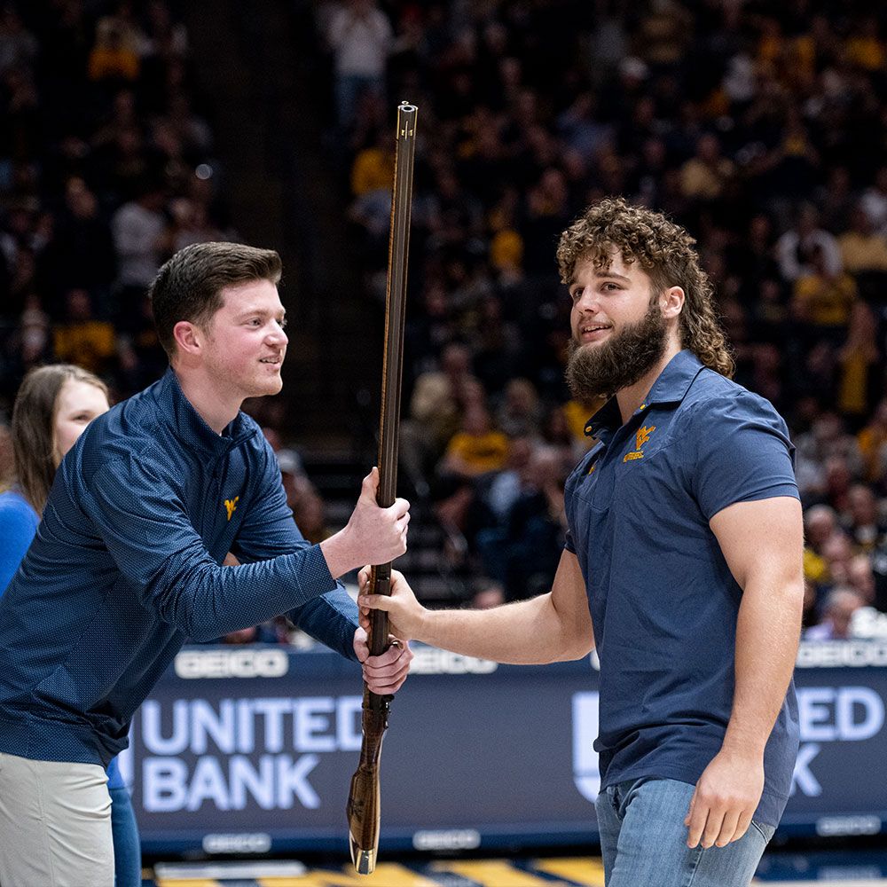 Mikel Hager receives the Mountaineer rifle