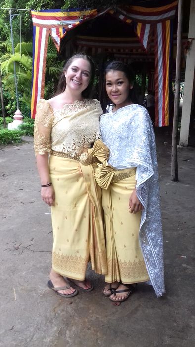 Elizabeth Andrick attends her friend's wedding in Cambodia wearing local garb.
