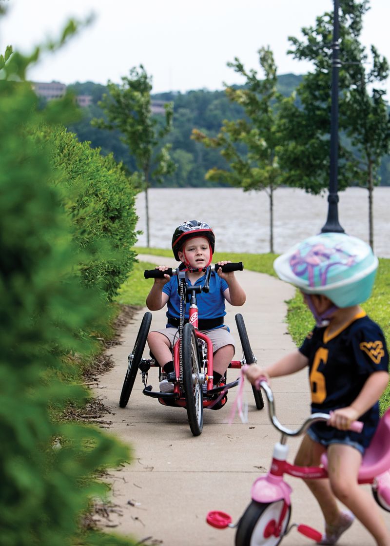 Brantly Poling, 7, uses his handcycle