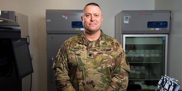 Man smiling in U.S. Army uniform