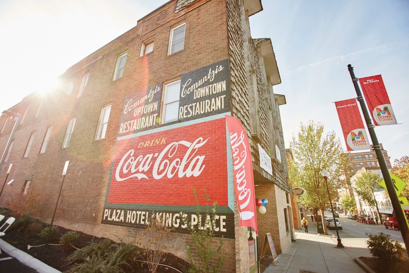 The restored Coca-Cola sign located at what used to be Comuntzis.