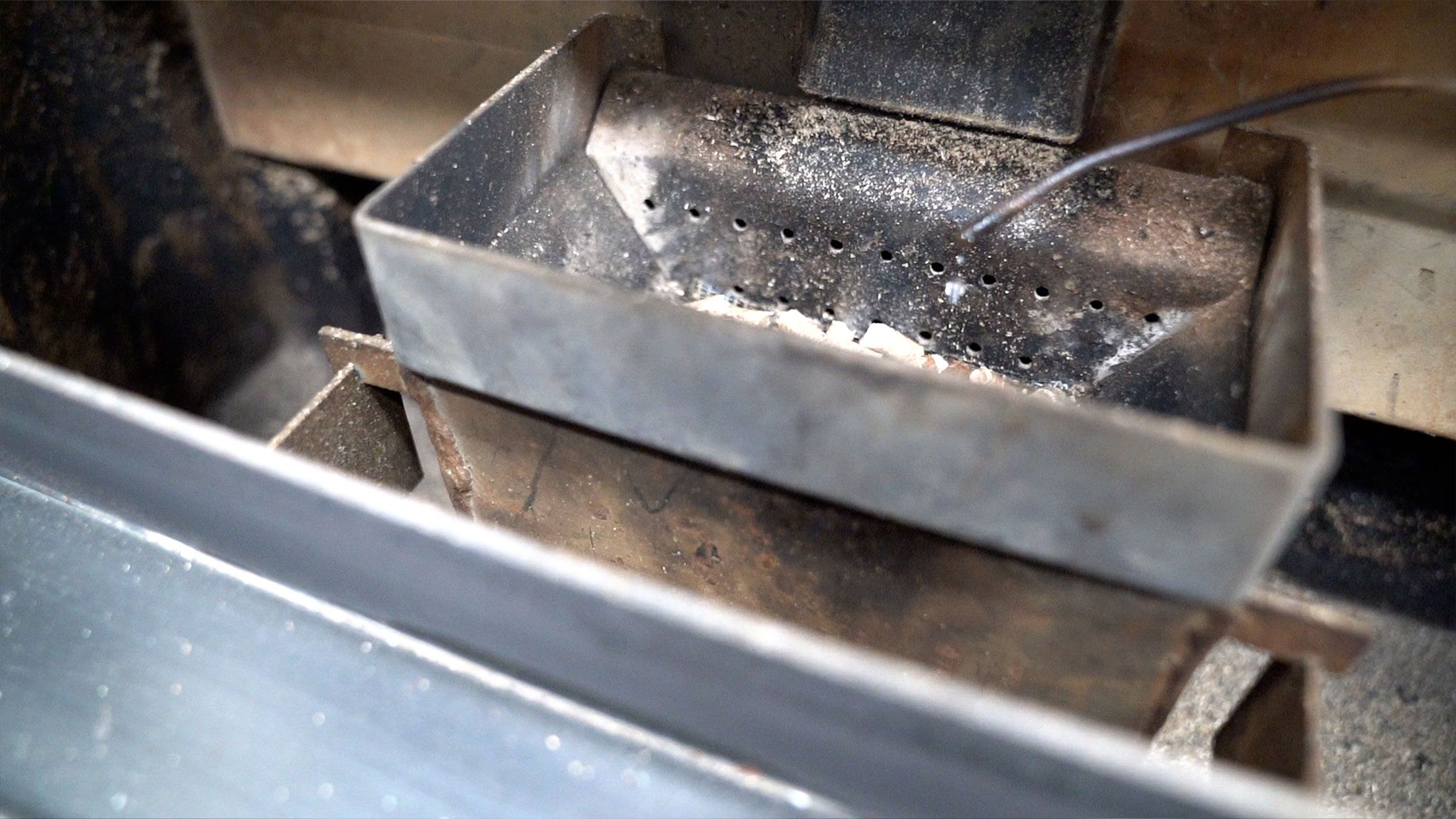 A pellet stove is used to recreate burn pit conditions at the WVU Health Sciences
  Center's Inhalation Facility.