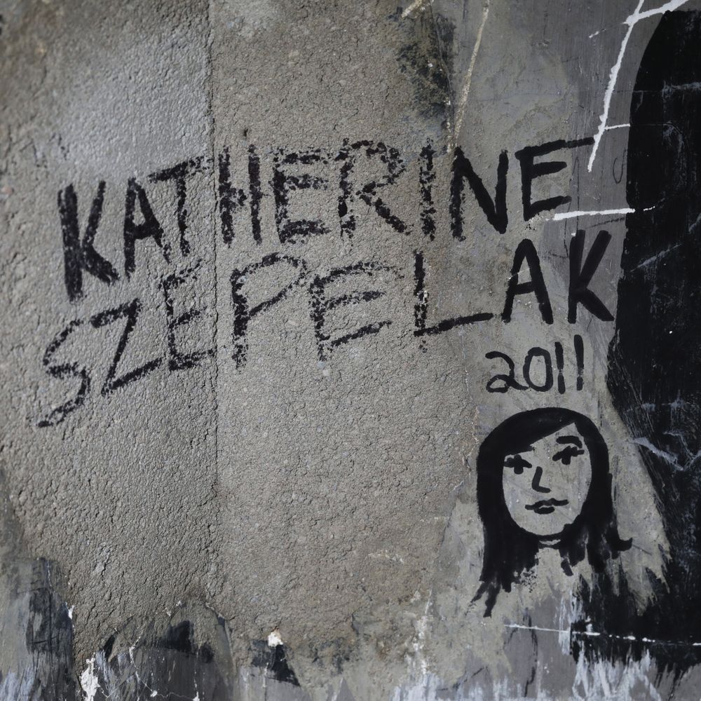 Katherine Szepelak signed her name and drew her likeness in the cupola at Woodburn Hall.