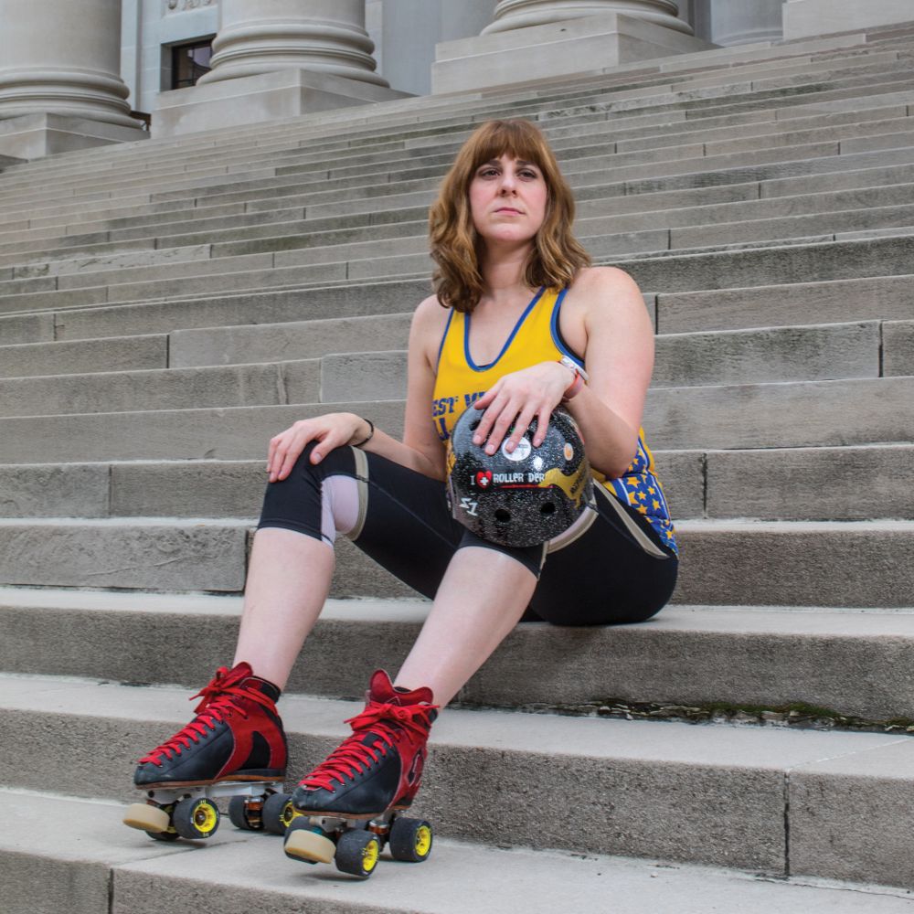 Mindy Parsley in roller skates on the West Virginia State Capitol steps.