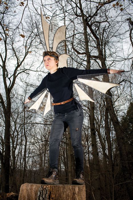 Rebecca Graham wears her winged sculpture.
