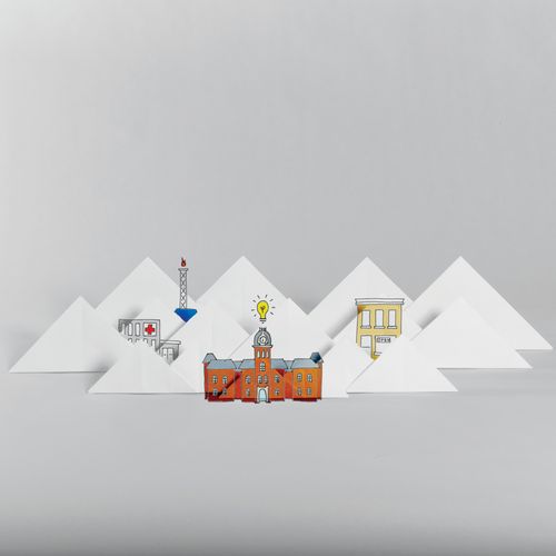 Depiction of Woodburn hall, mountains, gas well and downtown in origami.