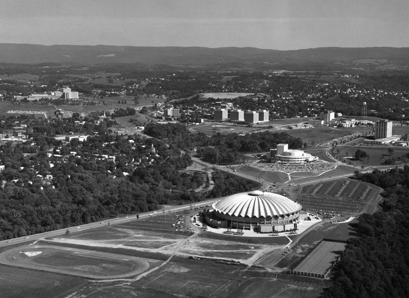 Aerial shot of the Coliseum in the foreground of Evansdale Campus.
