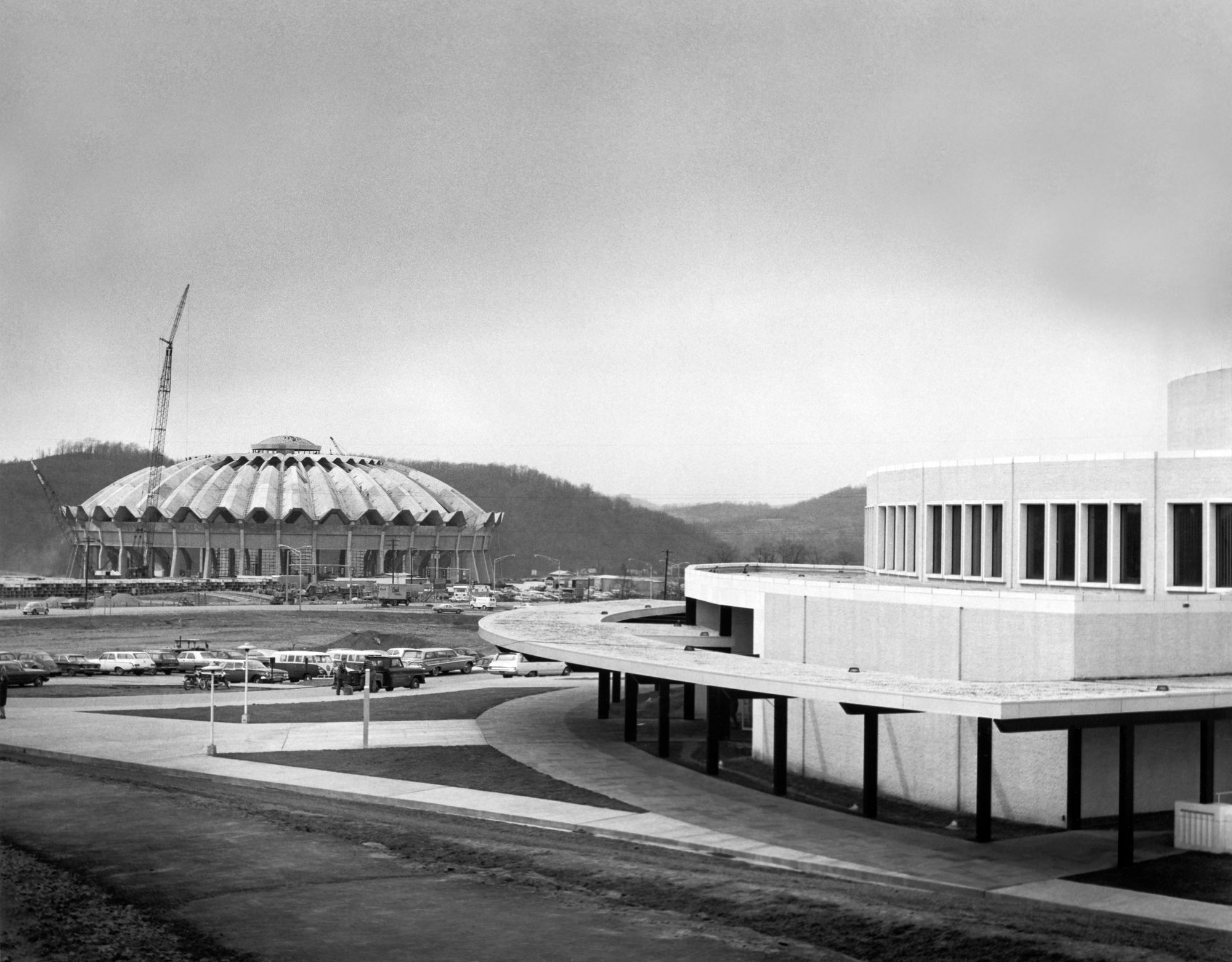 The Coliseum under construction with the Creative Arts Center in the foreground.