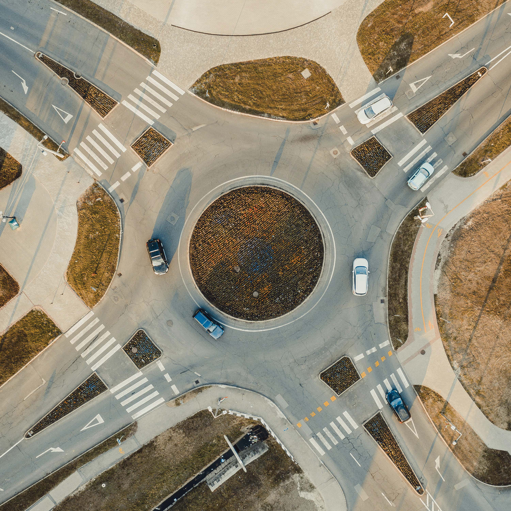 Cars driving around a roundabout