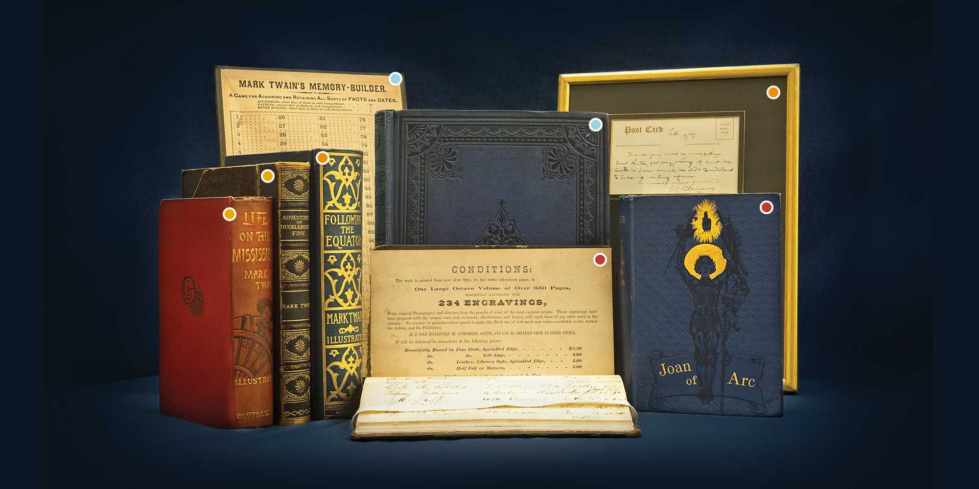 Books and items from the Mark Twain Collection at WVU Libraries.